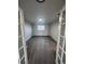 An inviting living area with hardwood flooring and natural light from a window at 4665 W 6Th Ave # 21, Denver, CO 80204