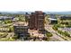 High-rise building with a street view showcasing the surrounding cityscape and greenery at 8100 E Union Ave # 712, Denver, CO 80237