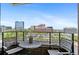 Inviting balcony offers an outdoor seating area with beautiful city views at 8100 E Union Ave # 712, Denver, CO 80237
