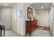 Apartment entryway with cabinet for storage, tasteful decor, and multiple entry doors at 8100 E Union Ave # 712, Denver, CO 80237