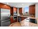 Well-equipped kitchen features stainless steel appliances, sleek cabinetry, and modern finishes at 8100 E Union Ave # 712, Denver, CO 80237