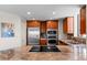 Modern kitchen showcasing stainless steel appliances, granite countertops, and a sleek cooktop at 8100 E Union Ave # 712, Denver, CO 80237