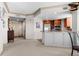 Inviting open floor plan features an updated kitchen, an entrance and stylish furnishings in neutral tones at 8100 E Union Ave # 712, Denver, CO 80237