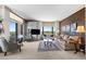 Elegant living room with neutral tones, comfortable seating, and expansive windows offering scenic views at 8100 E Union Ave # 712, Denver, CO 80237