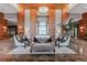 Elegant lobby with stylish seating arrangements, modern lighting fixtures, and sophisticated decor at 8100 E Union Ave # 712, Denver, CO 80237