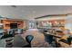 Spacious recreation room with comfortable seating, a kitchenette, and plenty of natural light for relaxing or entertaining at 8100 E Union Ave # 712, Denver, CO 80237