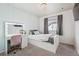 Bedroom with a vanity, drawers, a closet, and a window providing natural light at 11072 Quail Ct, Parker, CO 80134