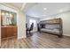 Spacious bedroom with a bunkbed, and vinyl floors, next to a modern style bathroom at 11072 Quail Ct, Parker, CO 80134