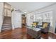 Welcoming entryway with hardwood floors, staircase, and a stylish built-in storage solution at 11072 Quail Ct, Parker, CO 80134
