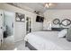 Bright main bedroom featuring a vaulted ceiling, recessed lighting, and a ceiling fan at 11072 Quail Ct, Parker, CO 80134