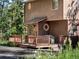 Charming two-story home with wood siding and welcoming front porch at 10858 Norton Ave, Conifer, CO 80433