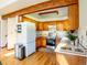Well-maintained kitchen with light wood cabinets and stainless steel appliances at 10858 Norton Ave, Conifer, CO 80433