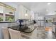 Charming kitchen featuring granite countertops, stainless steel appliances, and ample storage space at 11328 W 27Th Ave, Lakewood, CO 80215