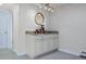 Cozy wet bar area featuring granite countertops, mirror, ample cabinet space and stylish lighting at 11328 W 27Th Ave, Lakewood, CO 80215