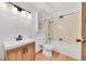 Clean and bright bathroom with a shower-tub combination, a contemporary vanity and fixtures, plus hardwood floors at 3022 S Wheeling Way # 205, Aurora, CO 80014