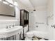 Bathroom features a single sink vanity and bathtub with shower at 3082 S Wheeling Way # 106, Aurora, CO 80014