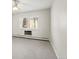 Bright bedroom features neutral carpet, ceiling fan and window at 3082 S Wheeling Way # 106, Aurora, CO 80014