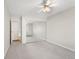 Spacious bedroom with carpet, ceiling fan and mirrored closet at 3082 S Wheeling Way # 106, Aurora, CO 80014