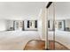 Open living space featuring mirrored closet, wall to wall carpet and nice windows at 3082 S Wheeling Way # 106, Aurora, CO 80014