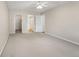 Spacious main bedroom with ensuite bath access, featuring a ceiling fan for added comfort at 3082 S Wheeling Way # 106, Aurora, CO 80014