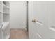 A walk-in closet with adjustable shelves, providing ample storage space at 3082 S Wheeling Way # 106, Aurora, CO 80014