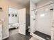 Clean bathroom with shower and toilet, near bedroom at 846 S Sheridan Blvd, Denver, CO 80226