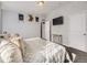 Bright bedroom with a queen-size bed and plenty of light at 846 S Sheridan Blvd, Denver, CO 80226