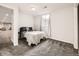 Small basement bedroom with carpet and window at 846 S Sheridan Blvd, Denver, CO 80226