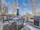 Deck with seating area, umbrella, and grill at 846 S Sheridan Blvd, Denver, CO 80226