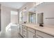 Bathroom boasts a double vanity with modern fixtures and ample counter space at 6882 Oak Canyon Cir, Castle Pines, CO 80108