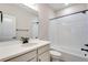 Bathroom with white subway tile, black hardware, and single vanity at 6882 Oak Canyon Cir, Castle Pines, CO 80108