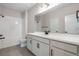 Well-lit bathroom with double vanity and modern finishes at 6882 Oak Canyon Cir, Castle Pines, CO 80108
