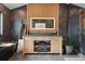 Luxurious bathroom with black bathtub and modern wood finishes at 1801 Redwood Ave, Boulder, CO 80304