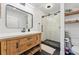 Stylish bathroom featuring a modern vanity, a glass-enclosed shower, and sleek finishes at 1801 Redwood Ave, Boulder, CO 80304