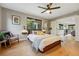 This bedroom includes hardwood floors, a ceiling fan, and natural light at 1801 Redwood Ave, Boulder, CO 80304