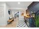 Hallway features modern furnishings, an artistic accent wall, and seamless flow at 1801 Redwood Ave, Boulder, CO 80304