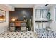 Stylish interior with a decorative accent wall, modern cabinet, attractive rug, and leads to the laundry room at 1801 Redwood Ave, Boulder, CO 80304