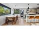 Bright kitchen with an island, stylish seating, and a dining area that offers a welcoming space at 1801 Redwood Ave, Boulder, CO 80304