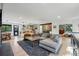 Bright open-concept living room showcases a cozy seating area and seamless flow to the kitchen at 1801 Redwood Ave, Boulder, CO 80304