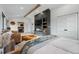 Modern bedroom with fireplace, TV, and access to ensuite at 1801 Redwood Ave, Boulder, CO 80304