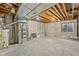 Unfinished basement with high ceilings and storage at 3300 W Florida Ave # 77, Denver, CO 80219