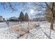 Community dog park with fenced area and seating at 3300 W Florida Ave # 77, Denver, CO 80219