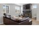 Inviting living room with a cozy fireplace and sleek design perfect for relaxation at 7040 Homeplace St, Castle Rock, CO 80108