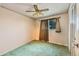 Cozy bedroom featuring a ceiling fan, window, and a built in closet at 3035 S Biscay St, Aurora, CO 80013