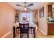 Charming dining room featuring classic decor, hardwood floors, and an inviting atmosphere for meals at 3035 S Biscay St, Aurora, CO 80013