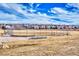 View of baseball field located in the neighborhood with a scattering of clouds above at 3035 S Biscay St, Aurora, CO 80013