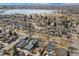Stunning aerial view of a neighborhood near a serene lake, offering picturesque surroundings at 2480 Quitman St, Denver, CO 80212