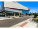 Modern commercial building featuring a mixed facade of concrete, stone, and glass, set along a city street at 925 Steele St, Denver, CO 80206