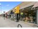 Storefront featuring large windows displaying a variety of cheeses at 925 Steele St, Denver, CO 80206