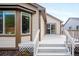 Charming back deck leading to the home's interior and backyard spaces at 21069 Woodside Ln, Parker, CO 80138